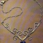 Etched Metal Jewelry With Rivets And Cabachon Set Stone Etched Metal Jewelry With Rivets And Cabachon Set Stone