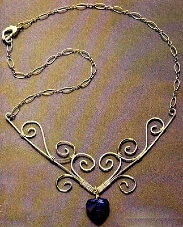 Etched Metal Jewelry With Rivets And Cabachon Set Stone