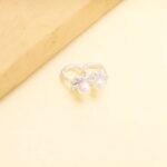 History of Betsey Johnson Jewelry Captivating timeline of Betsey Johnson's iconic jewelry pieces, showcasing the evolution of her distinctive style