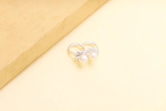 History of Betsey Johnson Jewelry 1 Captivating timeline of Betsey Johnson's iconic jewelry pieces, showcasing the evolution of her distinctive style