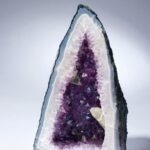 History of Amber Jewelry An intricate fossilized amber pendant showcasing the rich history of amber jewelry