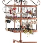 How to Identify Gemstones in Jewelry Sapphire, ruby, and emerald gemstones in a ring on a hand - How to identify gemstones in jewelry