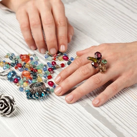 How Do They Add Small Diamonds to Jewelry 1 Semi-automatic process of delicately setting small diamonds onto jewelry, demonstrating fine craftsmanship