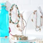 What Jewelry to Wear With a Gold Dress Glam statement necklace and matching earrings to elevate a gold dress ensemble