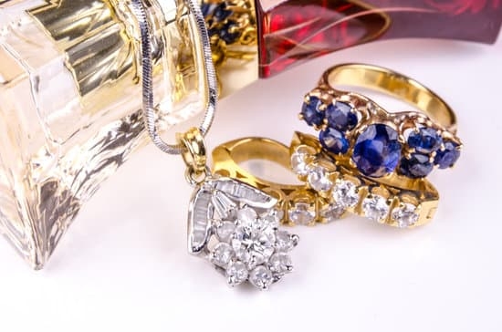 What Is the Best Way to Clean Gold Jewelry 1 Shining gold jewelry being cleaned using gentle soap and water, the best way to clean gold jewelry