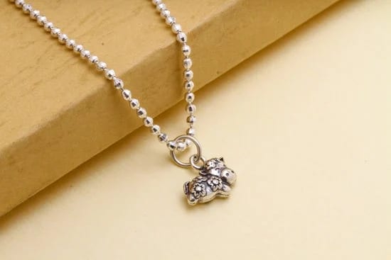 Tools to Make Beaded Jewelry 1 Variety of tools to make beaded jewelry like pliers, wire cutters, bead mats, and storage containers