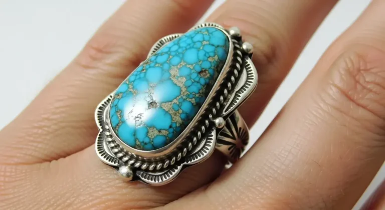Natural turquoise stone in Native American silver ring showing distinctive matrix patterns and blue-green coloration_risultato