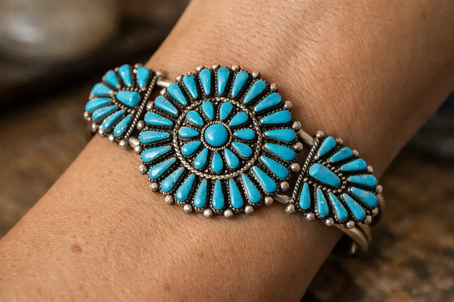 Zuni needlepoint turquoise cluster bracelet showing intricate stone setting and precise lapidary work characteristic of Zuni jewelry_risultato